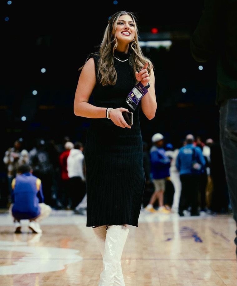 Abby Alonzo reporting courtside